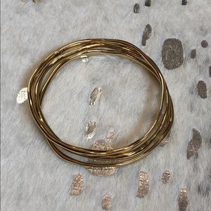Gold bangles Chloe and Isabel